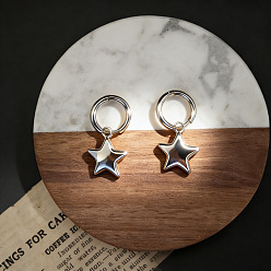 Платина Серьги-кольца из сплава в форме звезды, платина, 35x16 мм