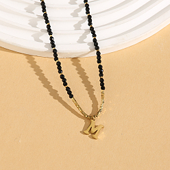 Letter M Женское ожерелье с подвеской из натуральной черной шпинели в форме круглой граненой буквы «Инициал» из нержавеющей стали, золотые, Буква М, 14.96 дюйм (38 см)