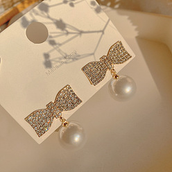 Bowknot Серьги-гвоздики из пластика с имитацией жемчуга, с кристально горный хрусталь, золотые, бантом, 30x30 мм