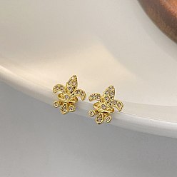 Золотой Женские серьги-гвоздики из латуни с микропаве из кубического циркония и изображением геральдической лилии., золотые, 13 мм