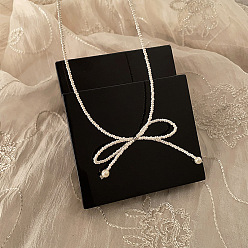 Белый Ожерелья с подвеской в виде банта из жемчужной смолы для женщин, белые, 16.89 дюйм (42.9 см)