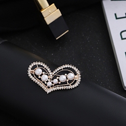 Сердце Брошь из сплава с имитацией жемчуга, с кристально горный хрусталь, сердце, 50x25 мм