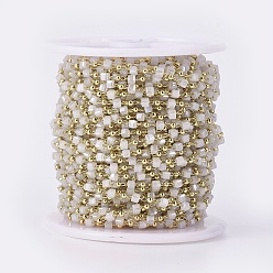 Гейнсборо Ручной цепи стекло бисером, пайки, с латунной фурнитурой , с катушкой, долговечный, золотые, кубические, светло-серые, 2.3~2.8x2.3~2.8x2.3~2.8 мм, 2 мм, около 32.8 футов (10 м) / рулон