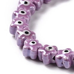 Medium Orchid Handmade Porcelain Ceramic Beads Strands, Famille Rose Style, Star with Evil Eye, Medium Orchid, 10.5x11x8mm, Hole: 3mm, about 32pcs/strand, 11.89~12.13 inch(30.2~30.8cm)