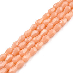 Легкий Лосось Непрозрачные сплошные цветные стеклянные бусины, Грановитая Teardrop, светлый померанцевый, 4x3 мм, отверстие : 0.8 мм, около 98~100 шт / нитка, 15.94 дюйм ~ 16.73 дюйм (40.5~42.5 см)